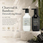 Two bottles of Theorie Sage Charcoal & Bamboo Detoxifying Ritual products on a neutral background with text and branding.