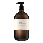 Brown shampoo bottle with pump and visible label on a white background